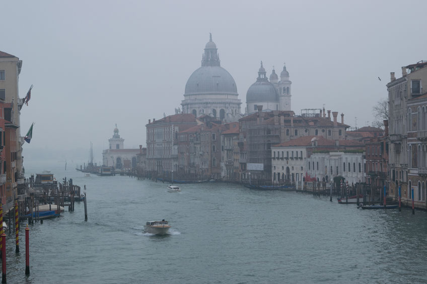 Take Gondola rides through the fog in Venice